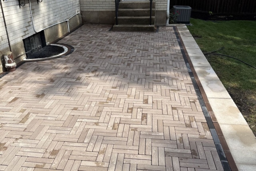 Unilock Mattoni Sable and Cocoa Brown Herringbone Pattern Hardscape Patio Riverwoods - Landscaping