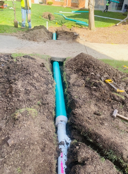 Drainage Pipe under Sidewalk / Northbrook  - Landscaping