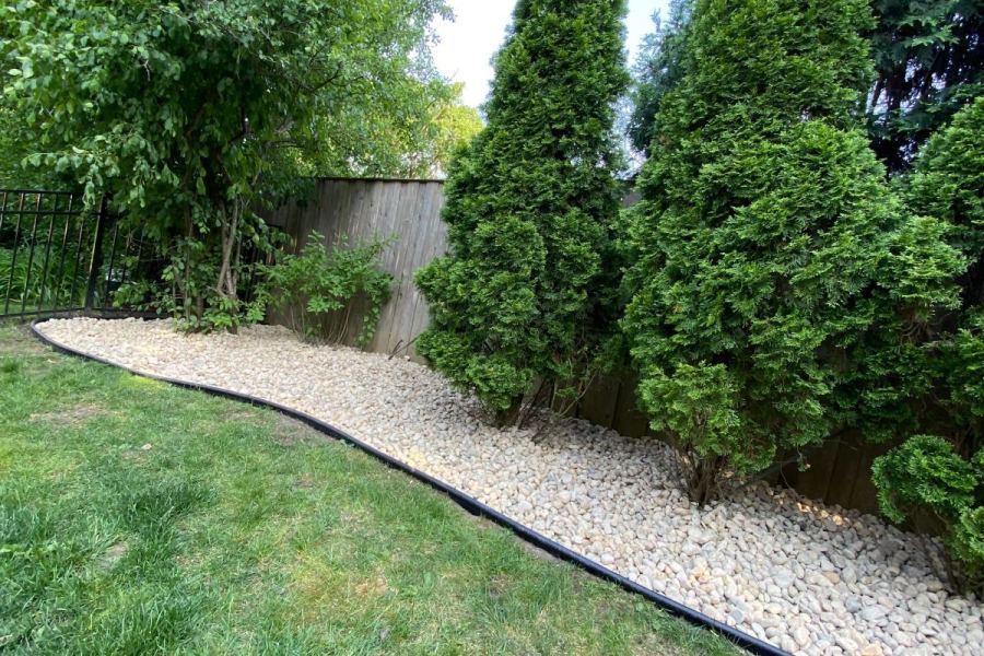 River Rock Bed Installation Low Maintenance Glencoe - Landscaping