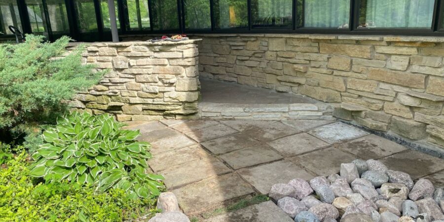 Backyard drainage and lawn restoration project in Barrington featuring French drain installation, grading corrections, PVC drainage piping, fresh sod installation, and backyard water management improvements