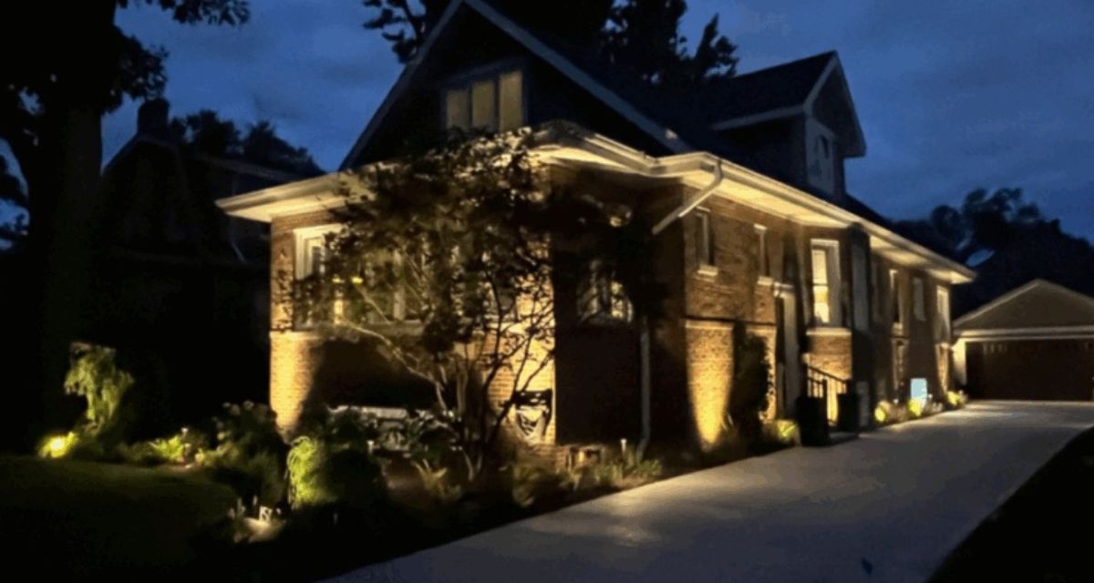 Wilmette property with new NDS drainage, underground irrigation, custom turf, fresh sod, hundreds of trees and shrubs, and Kichler landscape lighting throughout.