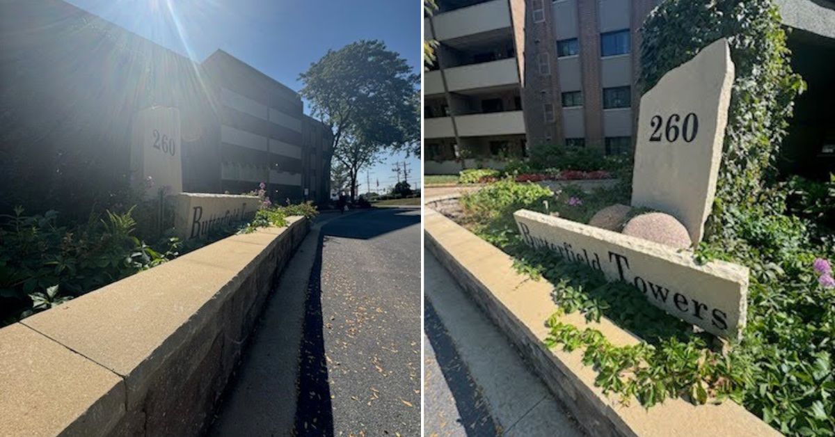 Retaining wall reconstruction and community entrance restoration in Kenilworth, IL with concrete foundation installation, drainage improvements, and monument reinstallation.