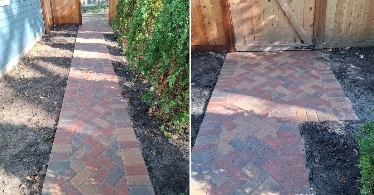 New brick paver walkway installation in Evanston, Illinois, connecting the back gate to a detached garage with a herringbone pattern.