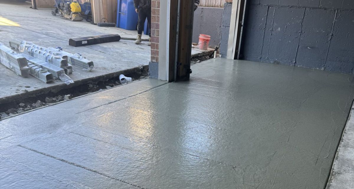 Lincoln Park Chicago garage drainage project with NDS channel drain and regraded concrete floor preventing flooding