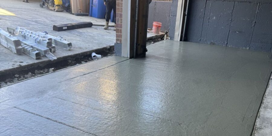 Lincoln Park Chicago garage drainage project with NDS channel drain and regraded concrete floor preventing flooding