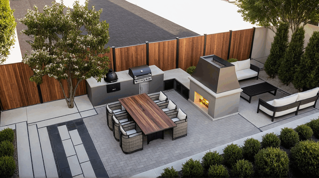 Modern outdoor kitchen with dining area and cozy built-in fire features creating warmth and stylish ambiance.