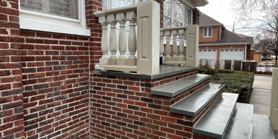 baluster-railing-custom-brick-and-mortar-stairs-project-in-park-ridge-1.jpeg