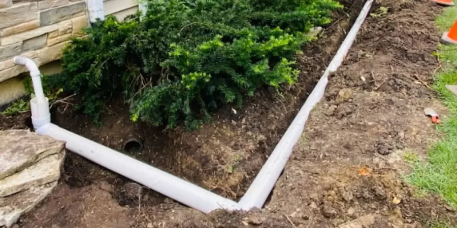 Professional drainage upgrades in Park Ridge home with installed piping to prevent flooding during heavy fall storms.