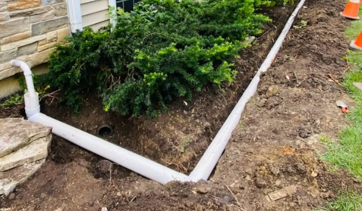 Professional drainage upgrades in Park Ridge home with installed piping to prevent flooding during heavy fall storms.