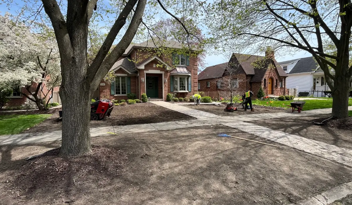 Prep Your Landscape with professionals preparing lawns, trees, planting beds, and soil before seasonal fall maintenance begins.