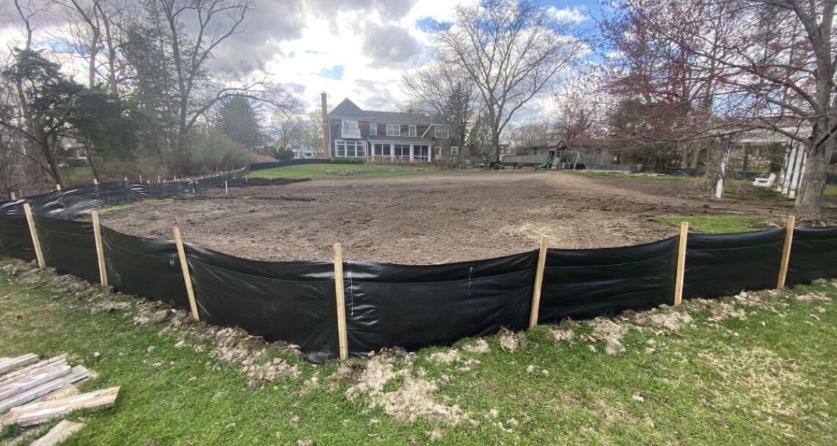 Northfield landscape drainage and grading project ensuring proper slope, village permit compliance, and expert yard solutions.